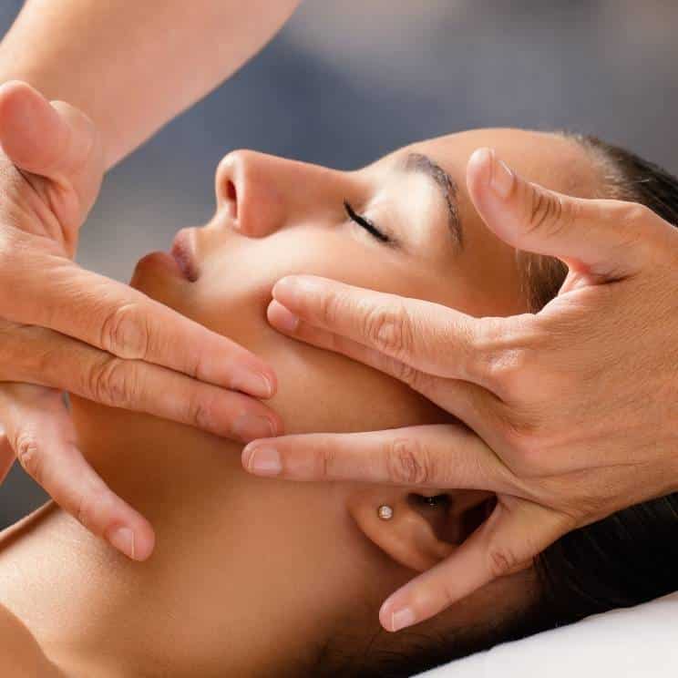 Woman receiving a natural face lift massage at Active Health Clinic Glasgow