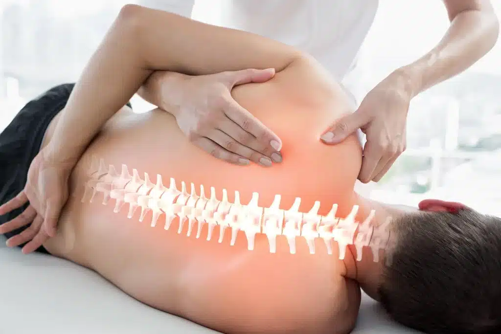 Physiotherapist treating a patient at Active Health Clinic Glasgow