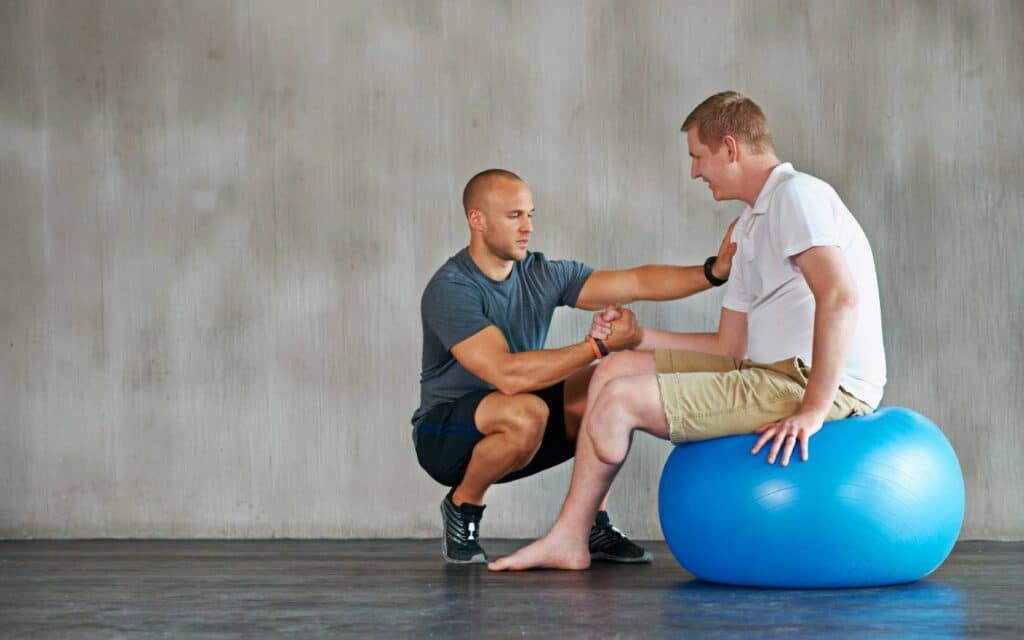 Therapist performing a Kinetic Chain Release treatment in Glasgow